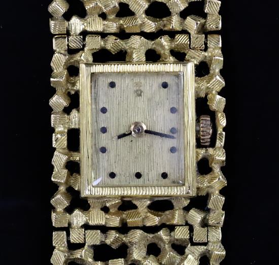 A ladys 18ct gold bracelet wristwatch by John Donald, circa 1970, with Corun movement (bracelet marked JAD) 15.2cm.